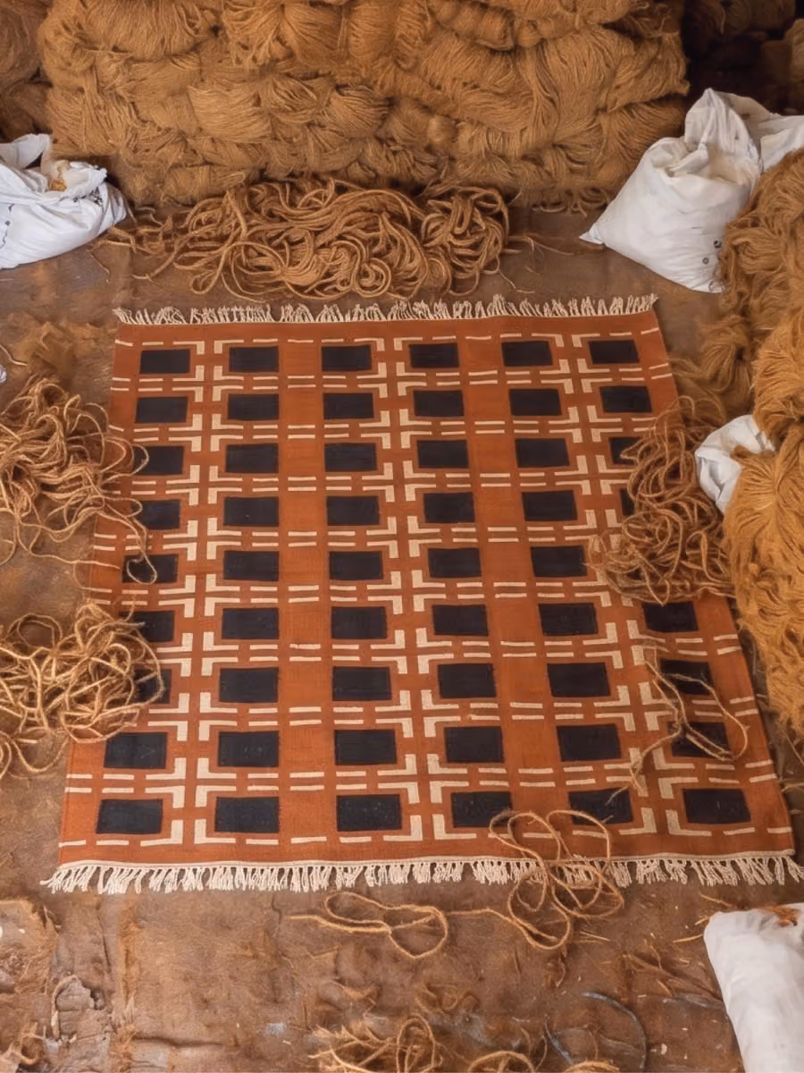Marches Flatwoven Rug shown in an editorial setting