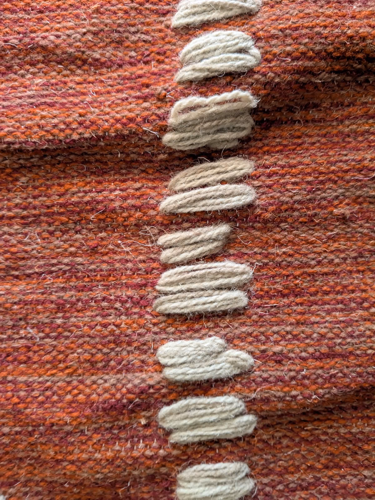 A close view of hand-worked textile fibers