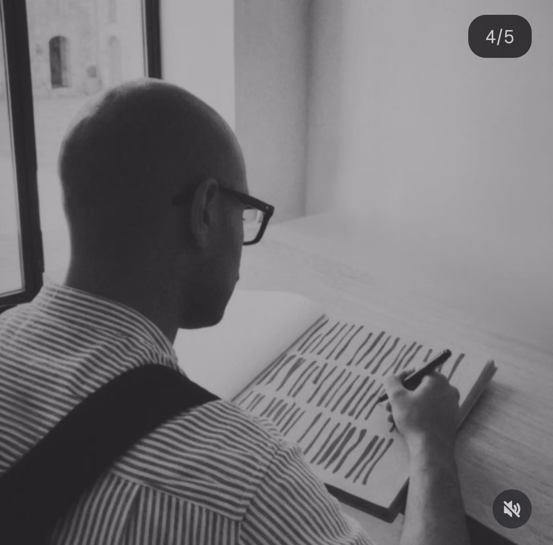 Seif sketching the Bark design in a sketchbook